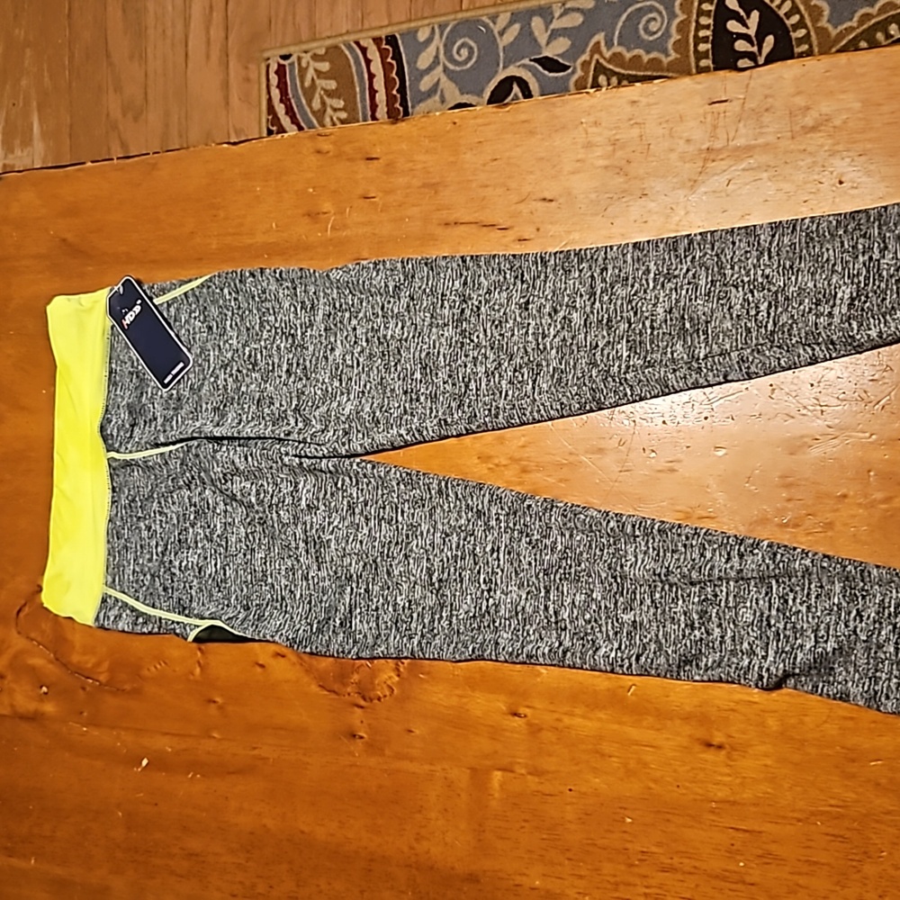NWT Haida Trading Leggings. Gray and yellow. Size Youth M-L.